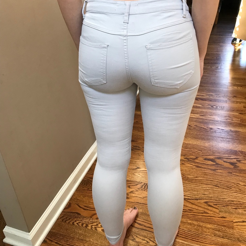 Cream skinny khaki pants.